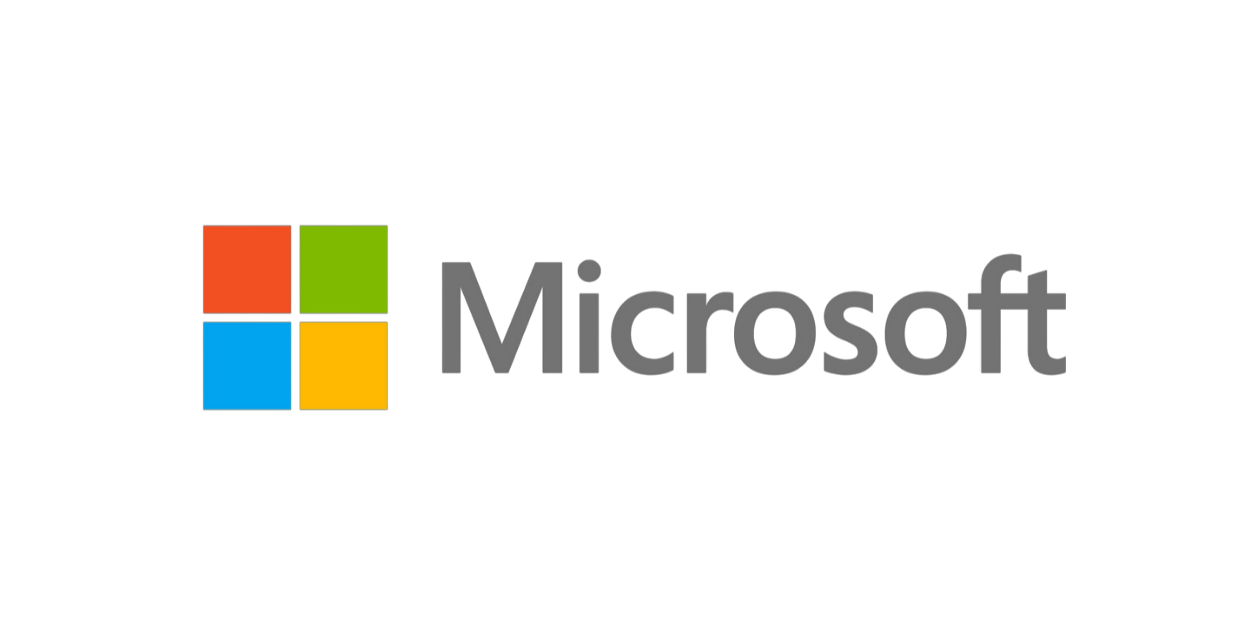 Microsoft Logo mit vierfarbigem Fenster-Symbol, bekannt für Software, Technologie, Cloud-Services und die globale Marke Microsoft