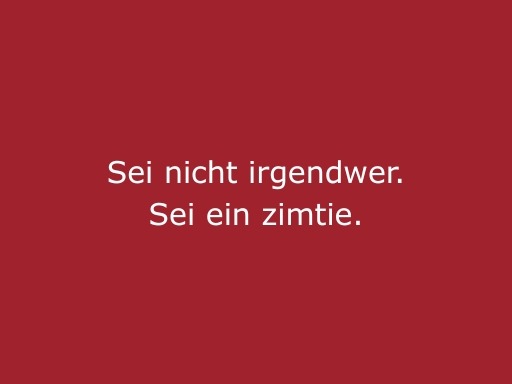 Roter Hintergrund mit beiger Schrift „Sei nicht irgendwer, sei ein zimtie“, modernes Statement für cinnamon Eventpersonal, Hospitality und besondere Einsätze bei Events und Promotion Aktionen